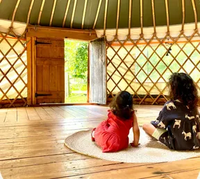 Mother and child in a yurt